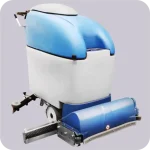 Autolaveuse Autotractée Fiorentini PINKY 32B : Diamètre de la brosse de 2 x Ø 410 mm, largeur de raclette de 980 mm, dimensions de 130 x 75 x 107 cm, poids de la batterie de 4 x 26 kg.